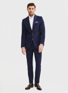 Jak wybrać idealny garnitur męski dla pana z brzuszkiem: kluczowe kroje i materiały